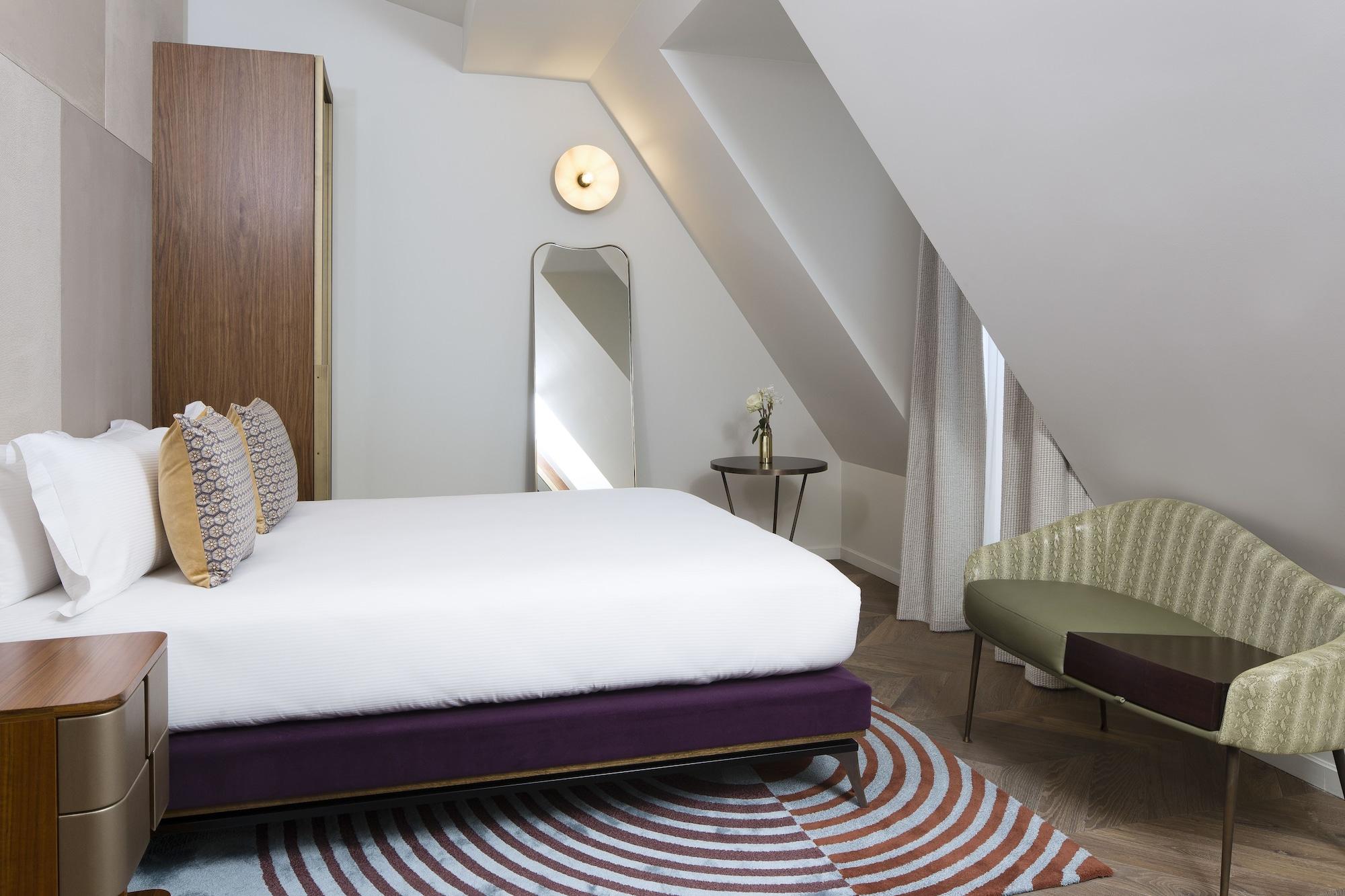 麦森博瑞固特酒店 巴黎 外观 照片 A bedroom at the Hotel 57