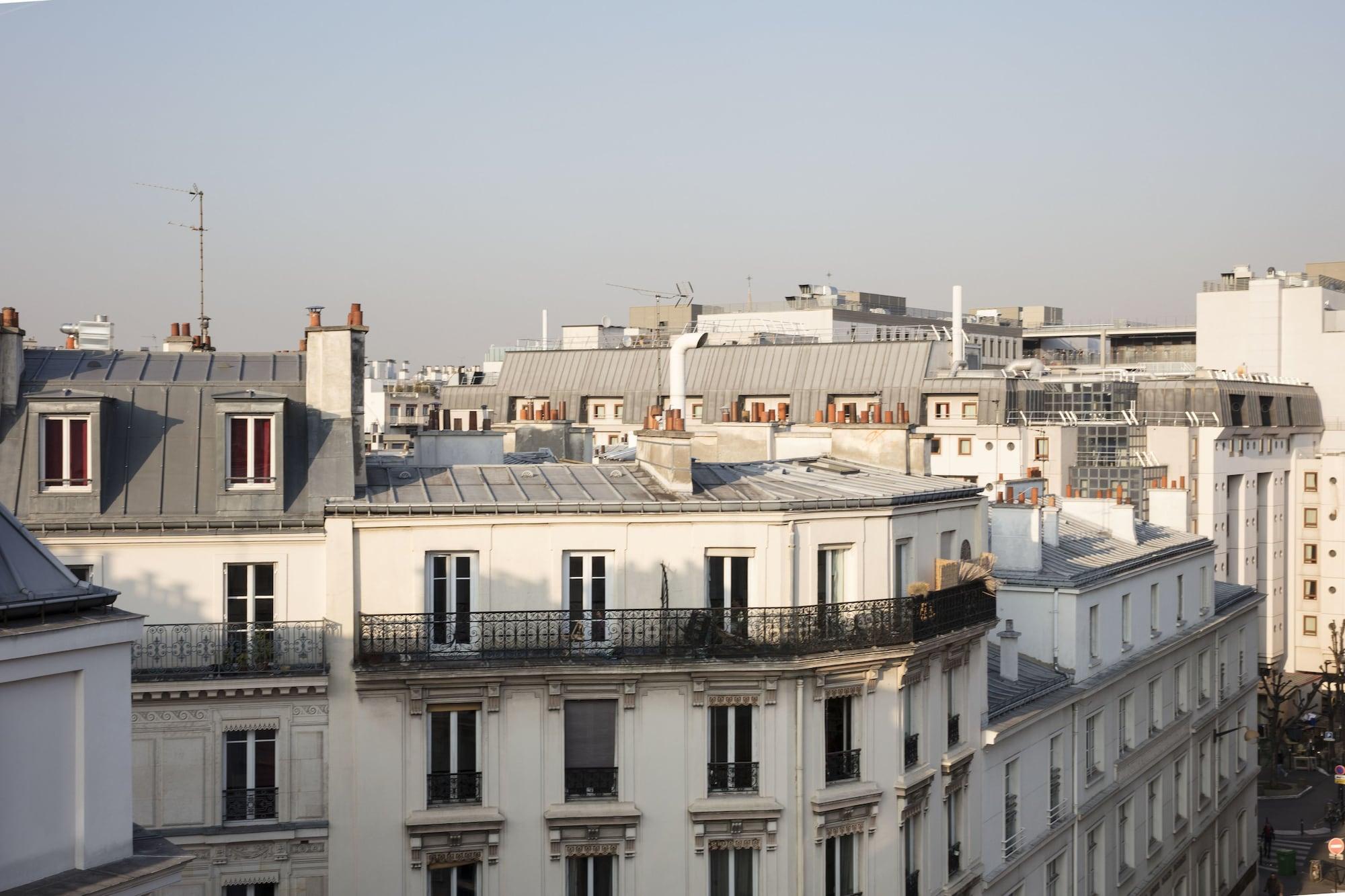 麦森博瑞固特酒店 巴黎 外观 照片 Haussmann apartment buildings in Paris