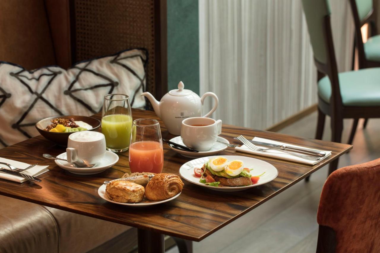 麦森博瑞固特酒店 巴黎 外观 照片 Breakfast at the hotel